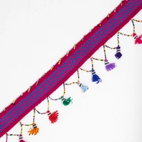حزام مصنوع يدويا بشرابات متعددة الألوان (الزهري و الأزرق)