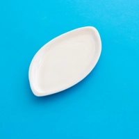 Small Plain White Ceramic Plate Designed in the Shape of an Olive Tree Leaf