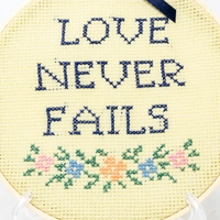Love Never Fails Embroidery Hoop