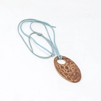 Oval Pottery Necklace with Engraved Floral Motifs