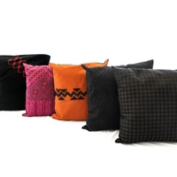 Square Orange Cushion with Black Embroidery Patterns