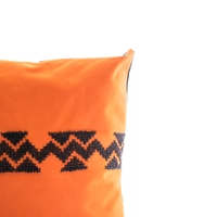 Square Orange Cushion with Black Embroidery Patterns