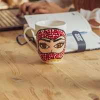 White Ceramic Mug Adorned with Hand Paintings - Woman Wearing a Shemagh