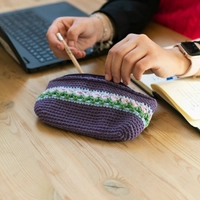 Purple Crochet Pencil Case with Colorful Floral Patterns