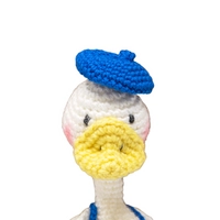 Hand-crocheted Cute Amigurumi Duck with Blue Hat