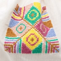 Handmade White Fabric Purse Adorned with Colorful Peasant Embroideries