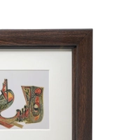 Rectangular Wooden Frame with a White Background and Three Photos symbolizing Palestine  