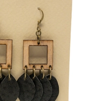 Unique Wooden Earrings with Metal Rings and Black Leaves