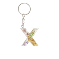 Resin Keychain with Dried Colorful Flowers in the Shape of the Letter X