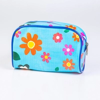 Vibrant Blue Pouch with Printed Designs of Colorful Flowers