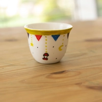 White Arabic Coffee Cup Adorned with Ramadan Inspired Drawings