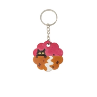 Cute Keychain in The Shape of a Flower Adorned with a Drawing of a Cat