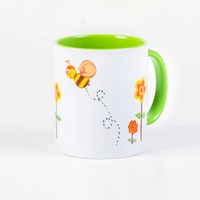 White & Green Ceramic Mug Featuring Bees Drawings Inspired by Children's Art at KHCC