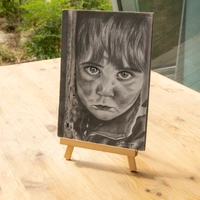 Pencil Drawing of a Child's Portrait with Artistic Precision and Realistic Details