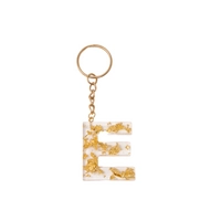 Handmade Transparent Resin Keychain in the Shape of the Letter E with Golden Sparkles