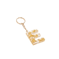 Handmade Transparent Resin Keychain in the Shape of the Letter E with Golden Sparkles