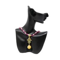 Handmade Fuchsia Beaded Necklace with a Golden Hamsa Hand Pendant