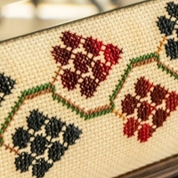 Square-shaped Wall Mirror with a Wooden Frame and Traditional Embroidery in Red