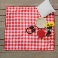 Checkered Red and White Picnic Blanket Decorated with Small Red Pompoms