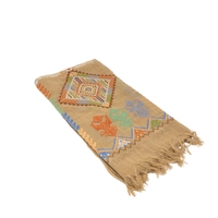 A beige shoulder scarf hand-embroidered with traditional patterns and vibrant colors