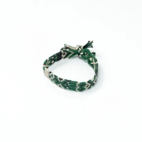 Friendship Bracelet: White and Green Braided Wool bracelet