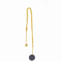 Long Golden Necklace with Circular Shiny Black Pendant