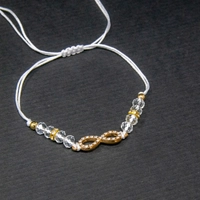 White Infinity Bracelet - Handmade of Adjustable String - Decorated with Beads