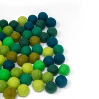 Colorful wool balls used with a wooden board game to teach children how to count! - Wool Balls Blue