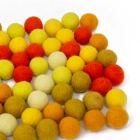 Colorful wool balls used with a wooden board game to teach children how to count! - Wool Balls Blue