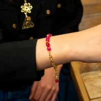 Modern Gold Accessory Set Decorated with Fuchsia Beads - Dangling Earrings, Necklace and Bracelet with a Flower Design