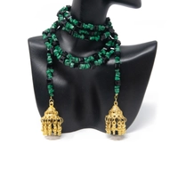 Elegant Accessory Set Consisting of Earring, Necklace , and two Bracelets Handcrafted from Green and Black Stones