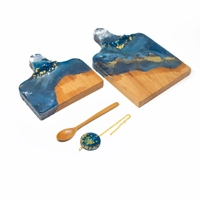 Set of Wooden Cheese Plater with a Wooden Spoon and a coffeepot chain.