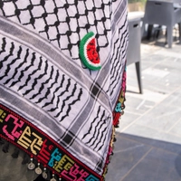 Embroidered Palestinian Kufiya with the names of Palestinian cities