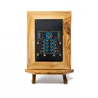 A wooden frame embroidered from the inside in the shape of a dress - purple color