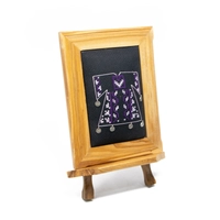 A wooden frame embroidered from the inside in the shape of a dress - purple color