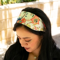 White headband with colorful floral patterns