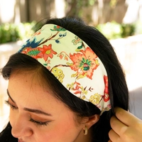 White headband with colorful floral patterns