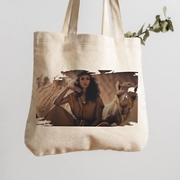 Stylish and practical canvas bag with a curly-haired girl behind a camel design