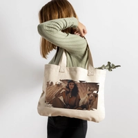 Stylish and practical canvas bag with a curly-haired girl behind a camel design