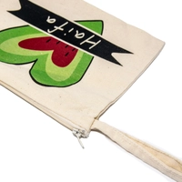 Hand-painted makeup bag featuring the word Haifa, celebrating the beauty and heritage of Palestine.