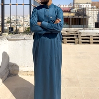 ثوب تطريز ازرق تركواز. 