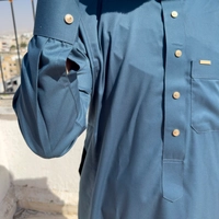 ثوب تطريز ازرق تركواز. 