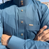 ثوب تطريز ازرق تركواز. 
