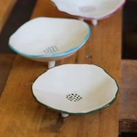 Porcelain Saucers in Blue, Maroon, and Green