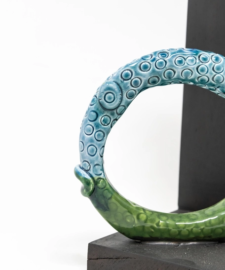 Circular Glazed Ceramic Bookend with Wooden Stand - Half Tail