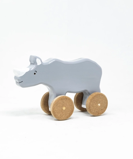 لعبة خشبية على شكل وحيد القرن بعجلات