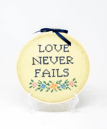 Love Never Fails Embroidery Hoop