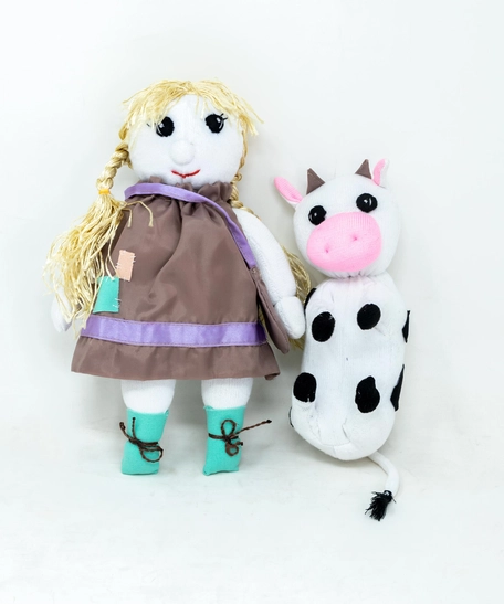 Girl and Cow Stuffed Toys