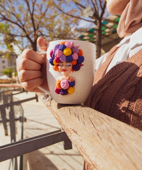 White Ceramic Mug Decorated with Hand-Formed Woman Figure