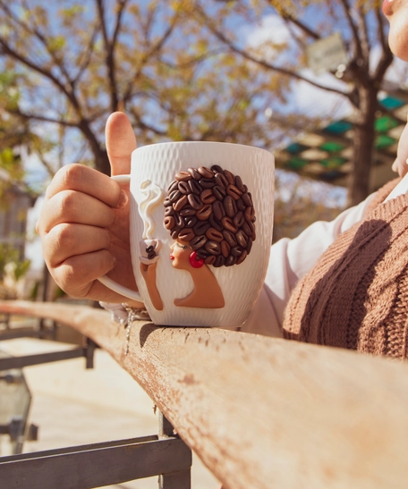 White Ceramic Mug with Polymer Clay Decoration of a Woman & Coffee Beans